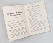 WeNatal journal opened to 50 questions to prepare for parenthood